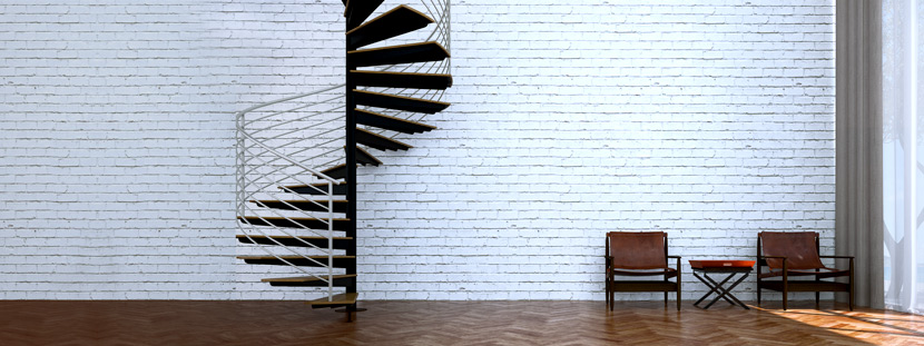 Wendeltreppe mit Säule: Eine Spindeltreppe führt in einen Raum mit Parkettboden und weißer Ziegelmauer. Im Raum stehen zwei Ledersessel und ein kleiner Klapptisch.