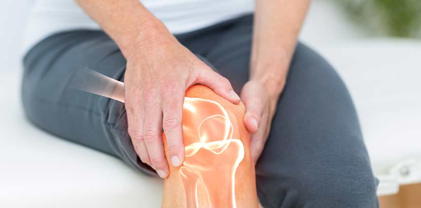 Patient, der Gelenkschmerzen im Knie hat. Orthopäde Wien.