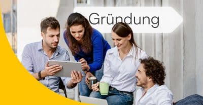 Bild zeigt Personen, die ein Startup gründen.