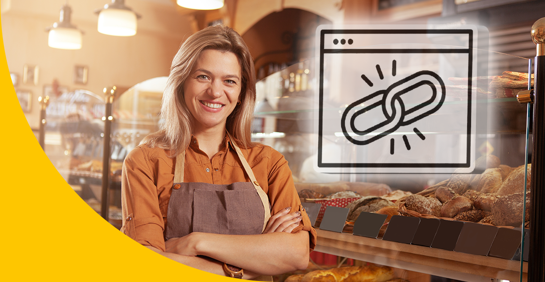 Bild zeigt Bäckerin in ihrer Bäckerei mit Symbol, das veranschaulicht, dass sie für ihr Unternehmen Offpage SEO betreibt.